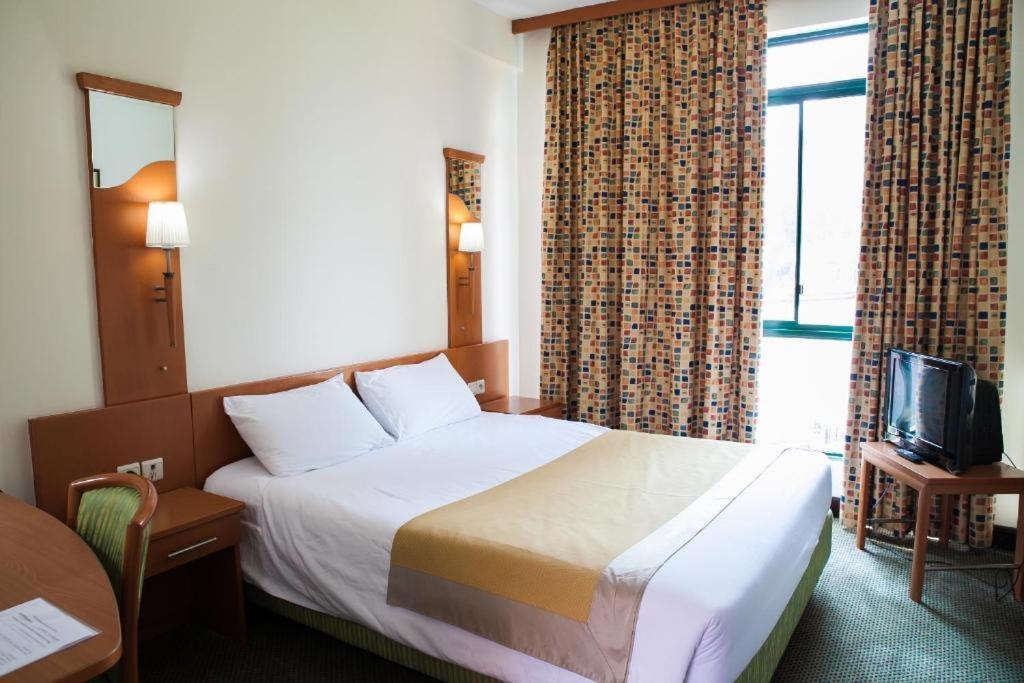 Gorillas Volcanoes Hotel Рухенгери Экстерьер фото